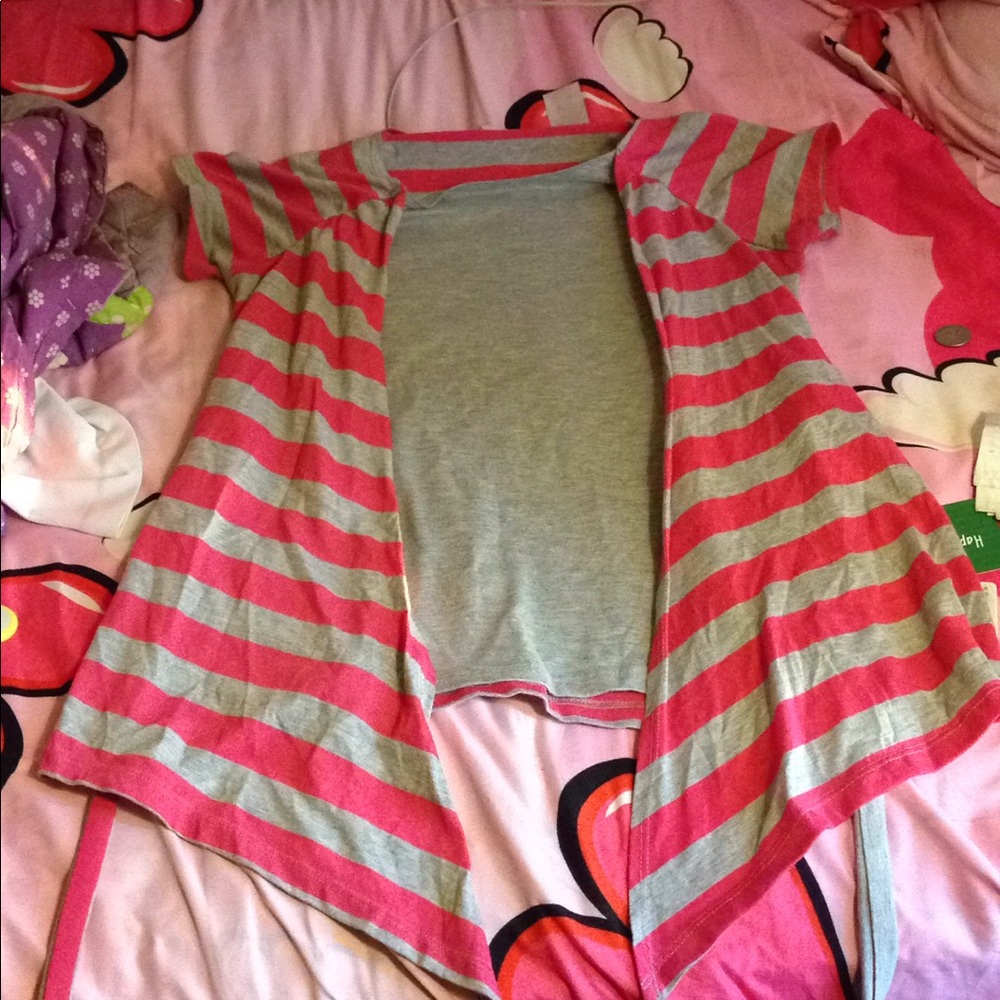 Grey and pink striped shirt with straps.